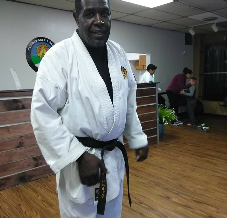 Sensei Amos Hamrick practicing martial arts
